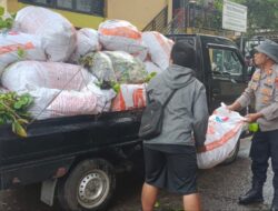 Polsek Mande dan Warga Bersihkan 30,6 Ton Eceng Gondok di Waduk Jangari