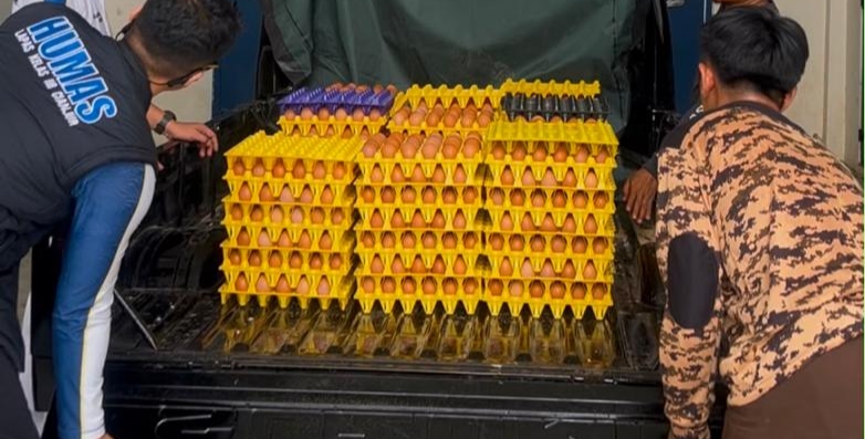 Teks: Distribusi 3.000 butir telur hasil pembinaan warga binaan Lapas Kelas IIB Cianjur ke Lapas Kelas IIA Sukabumi.